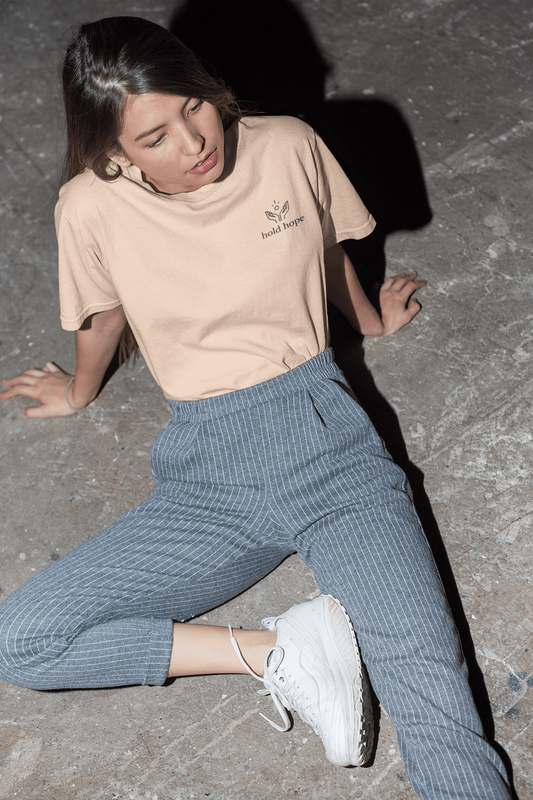 hold_hope_female_model_front_baby_peach